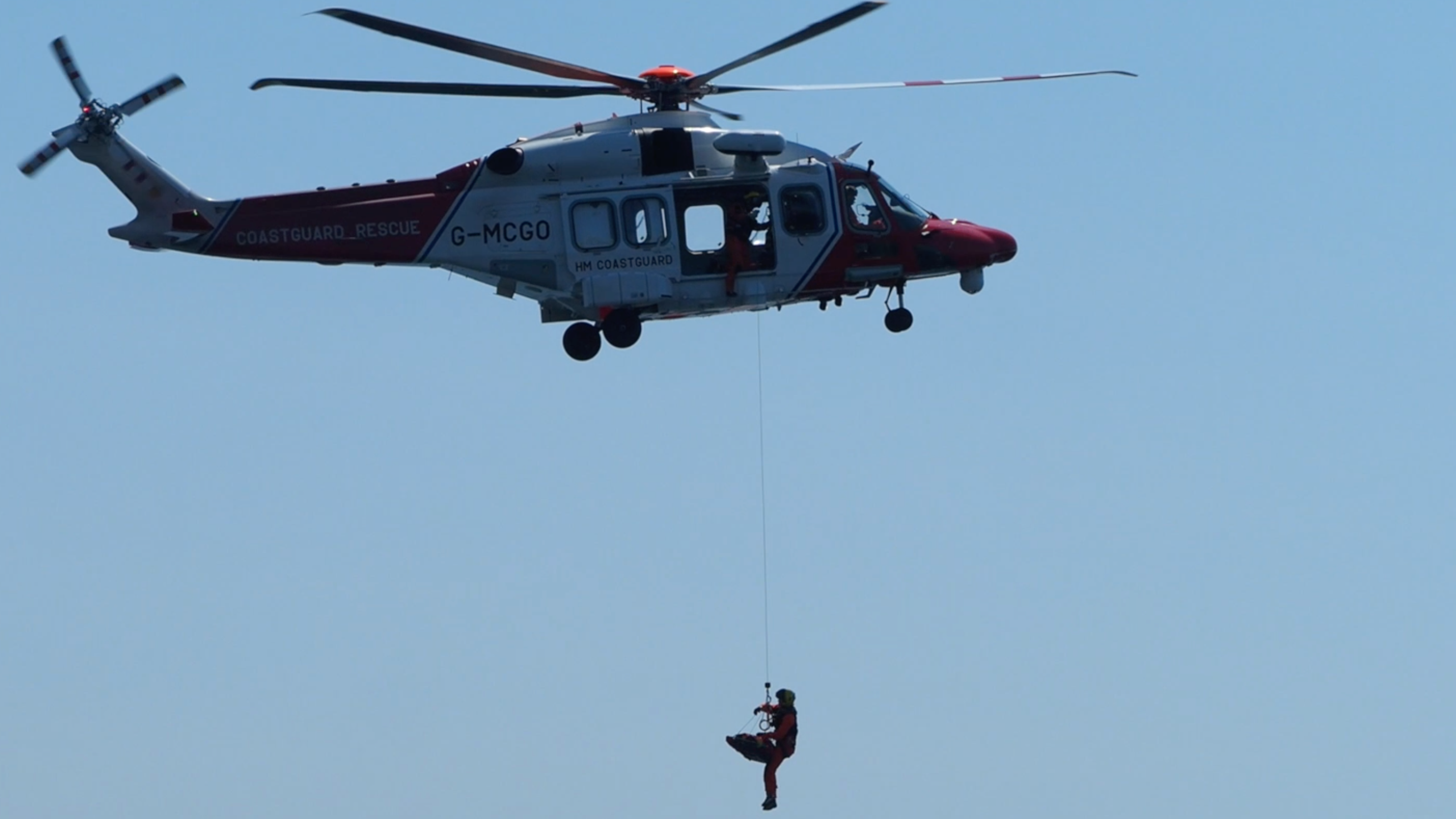 coastguard-helicopter-and-emergency-services-rescue-person-in-portland