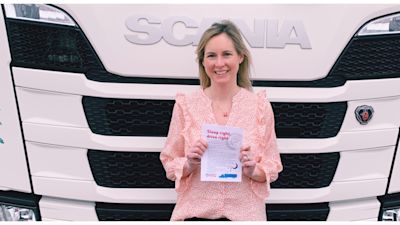 Picture of Pit Stop Director and hypnotherapist Hannah Hatherell in front of a truck.