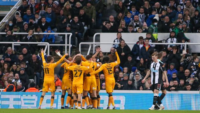 Cambridge United players celebrate after scoring against Newcastle United in the third round of the FA Cup. 
Copyright: PA