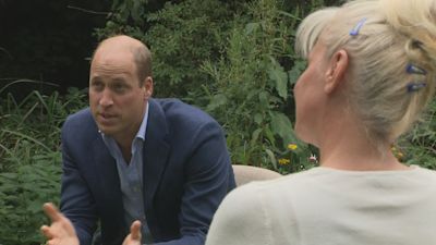 Prince William speaks to a group of former homeless people in Peterborough.