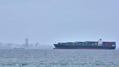 Tanker and container ship attacked after Iran re-closes Strait of Hormuz