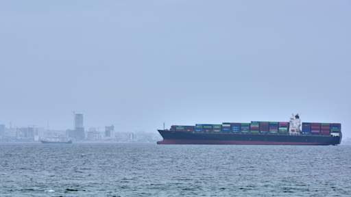 Tanker and container ship attacked after Iran re-closes Strait of Hormuz