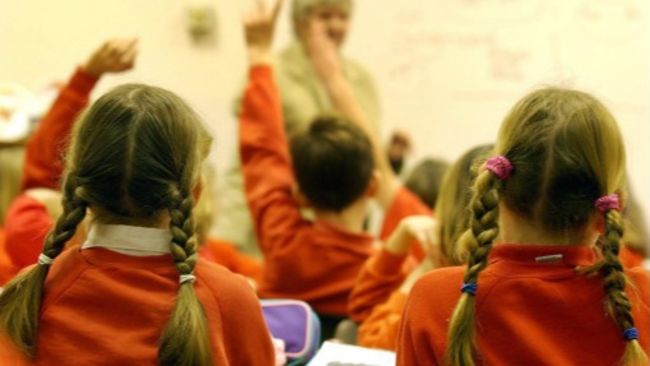 Reception pupils will receive free uniform under the plans.
Credit: PA