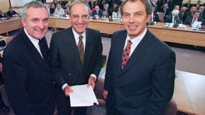 File photo dated 10/04/98 of Prime Minister Tony Blair (right), US Senator George Mitchell (centre) and Irish Prime Minister Bertie Ahern after they signed the Good Friday peace agreement, which stated that the people of Northern Ireland will decide democratically their own future. Tony Blair was advised that he should use the "Government machine" to push for a yes vote in the referendum on the Good Friday Agreement - but not to the extent that it would risk calling the result of the historic vote into question. Issue date: Thursday December 29, 202