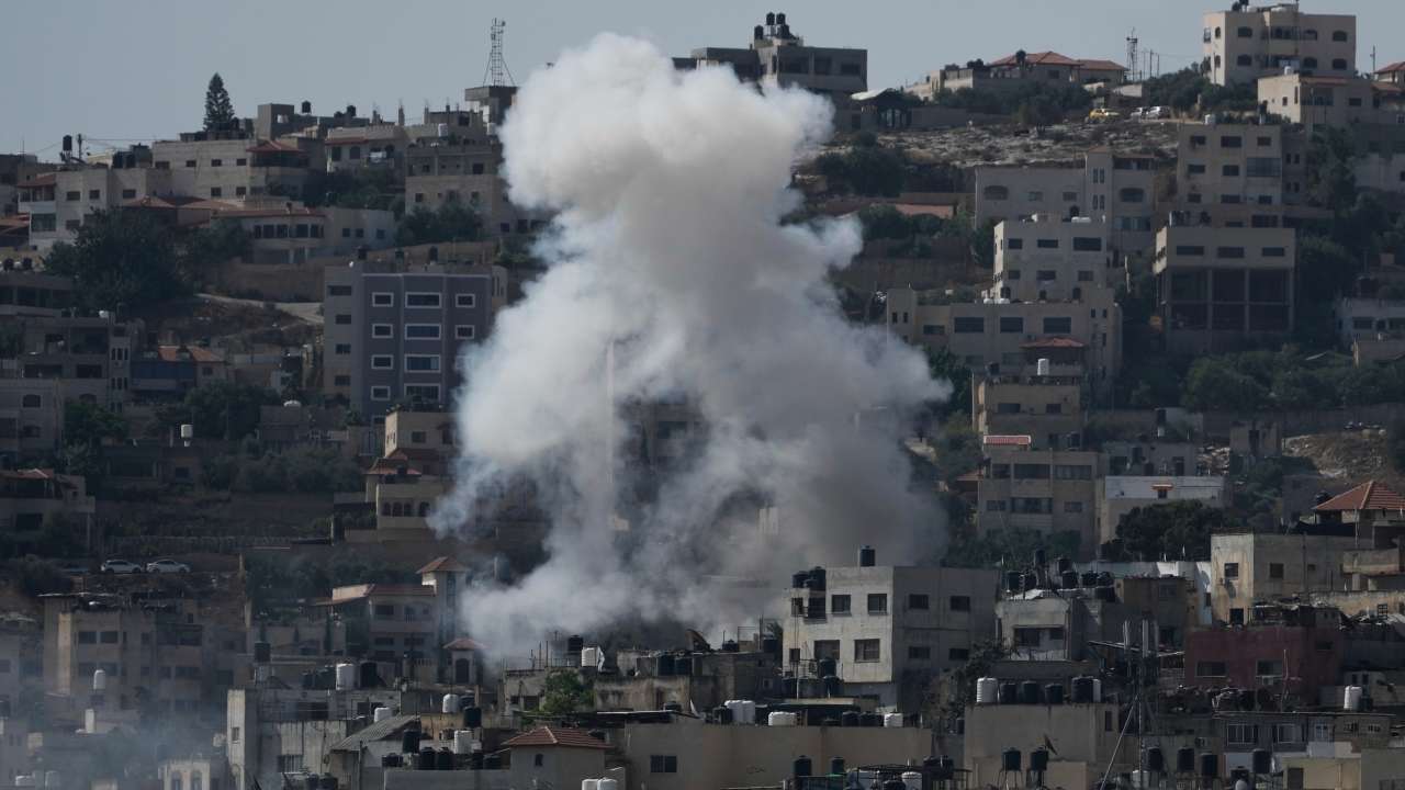 Three dead after 2,000 troops launch raid on Palestinian camp