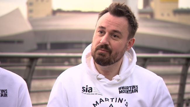 Martin Hibbert in his Martin's Mountain white sweatshirt