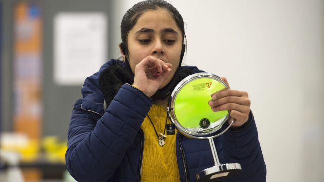 A student takes a Lateral Flow Test at Hounslow Kingsley Academy in West London, as pupils in England return to school for the first time in two months as part of the first stage of lockdown easing. Picture date: Monday March 8, 2021.  Kirsty O'Connor/PA  08-Mar-2021