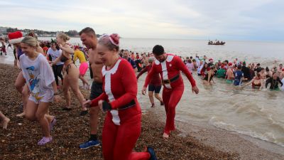 Hundreds spend Christmas Day plunging into the North Sea in Suffolk ...