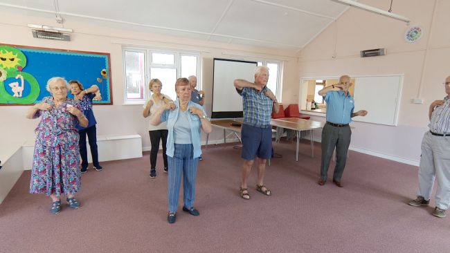 Some of the members taking part in a Tai-Chi session.