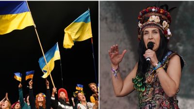 Ukrainian singer Jamala appears as a guest with folk quartet DakhaBrakha performing on the Pyramid Stage during the Glastonbury Festival at Worthy Farm in Somerset. Picture date: Sunday June 26, 2022. Festival goers wave Ukraine flags. PA