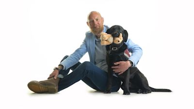 A man suffering with hearing loss and his mental health has thanked his hearing dogs for making him feel “10-feet tall” and engaging him back into society.