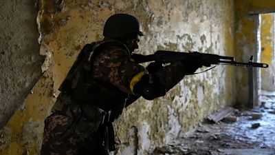 A Belarusian volunteer receives military training at the Belarusian Company base in Kyiv, Ukraine, Tuesday, March 8, 2022. Hundreds of Belarus' emigrants and citizens have arrived in Ukraine to help the Ukrainian army fight against Russian invaders.