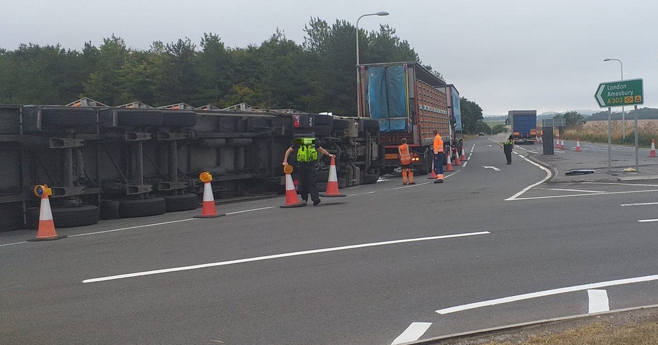 A303 closed to traffic as lorry full of chickens overturns in