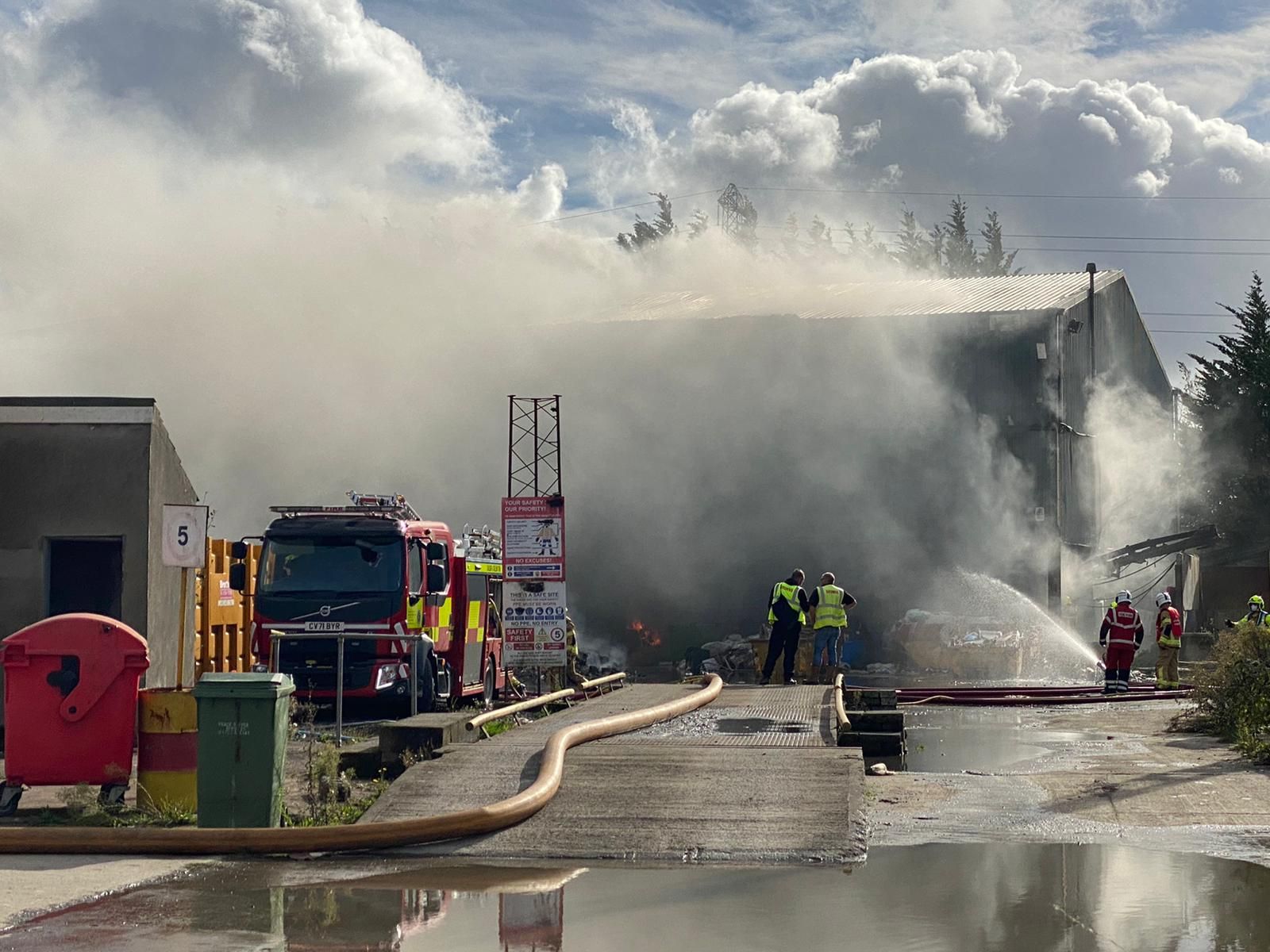 Firefighters tackle large fire at recycling centre near Llanelli ITV
