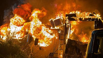 PHOTOGRAPH OF LORRIES ON FIRE IN TILBURY IN ESSEX CREDIT TO ESSEX COUNTY FIRE AND RESCUE SERVICE.