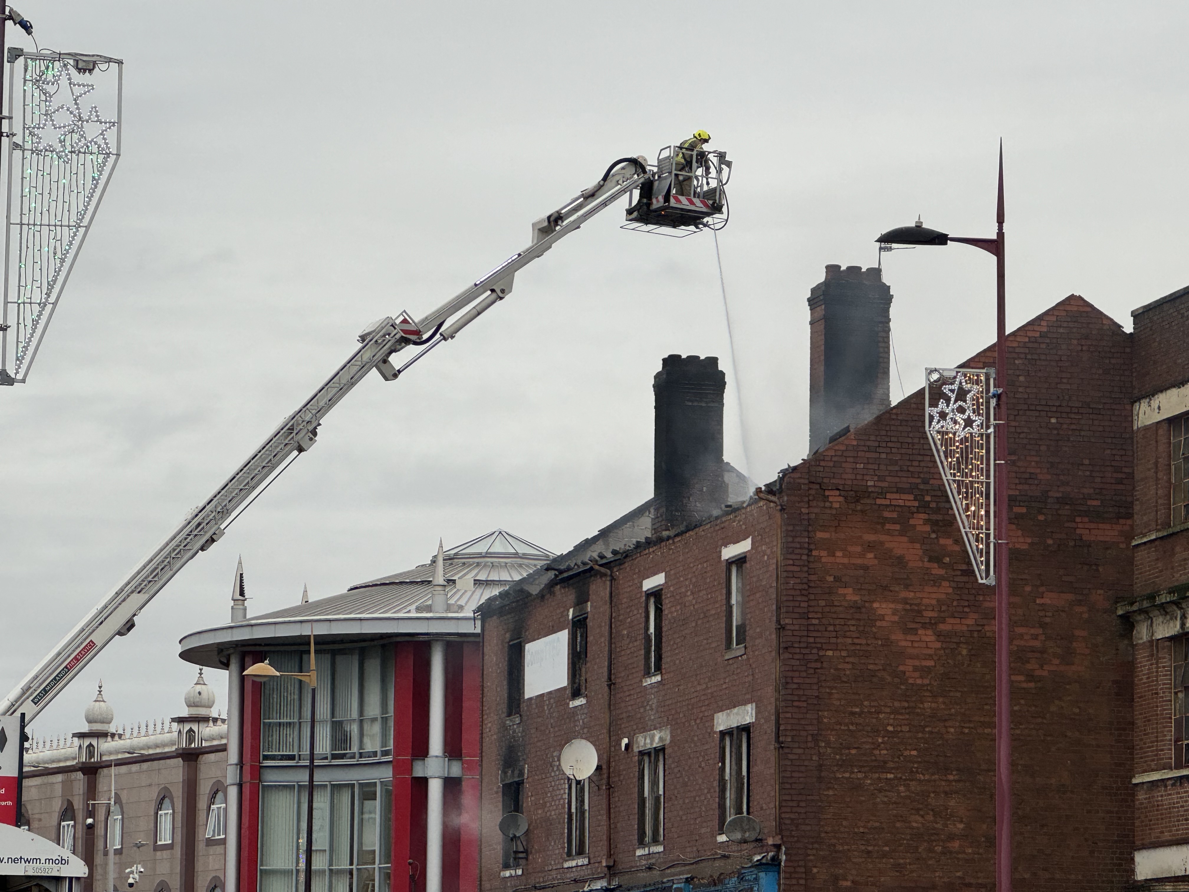 Birmingham roads closed due to huge fire with four rescued from