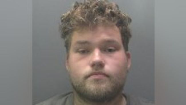 Custody image of Luke Jarrett, a white man in his 20s