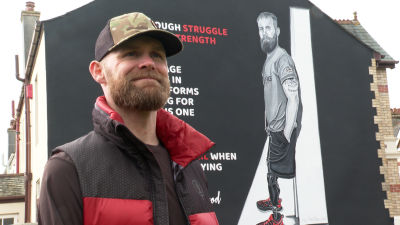 Mark Ormrod in front of his new mural