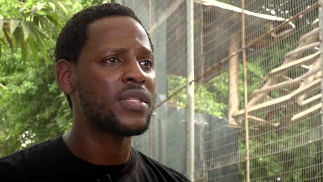 Chinedu Mogbu has rescued many animals from the wet market, ITV News.