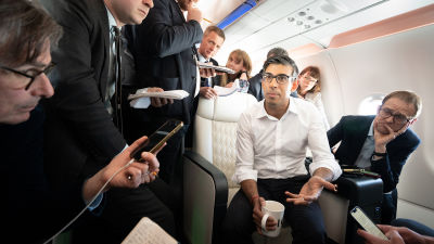 Prime Minister Rishi Sunak holds a huddle with political journalists on board a government plane as he heads to Japan to attend the G7 summit.
