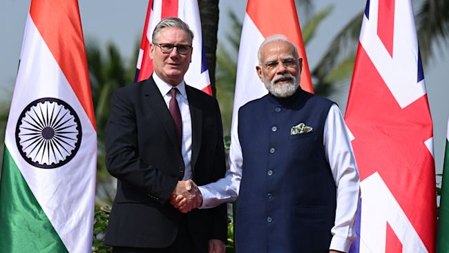 Sir Keir Starmer is greeted by Prime Minister of India Narendra Modi in October 2025.