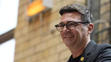 How is Andy Burnham planning to 'fix politics'?