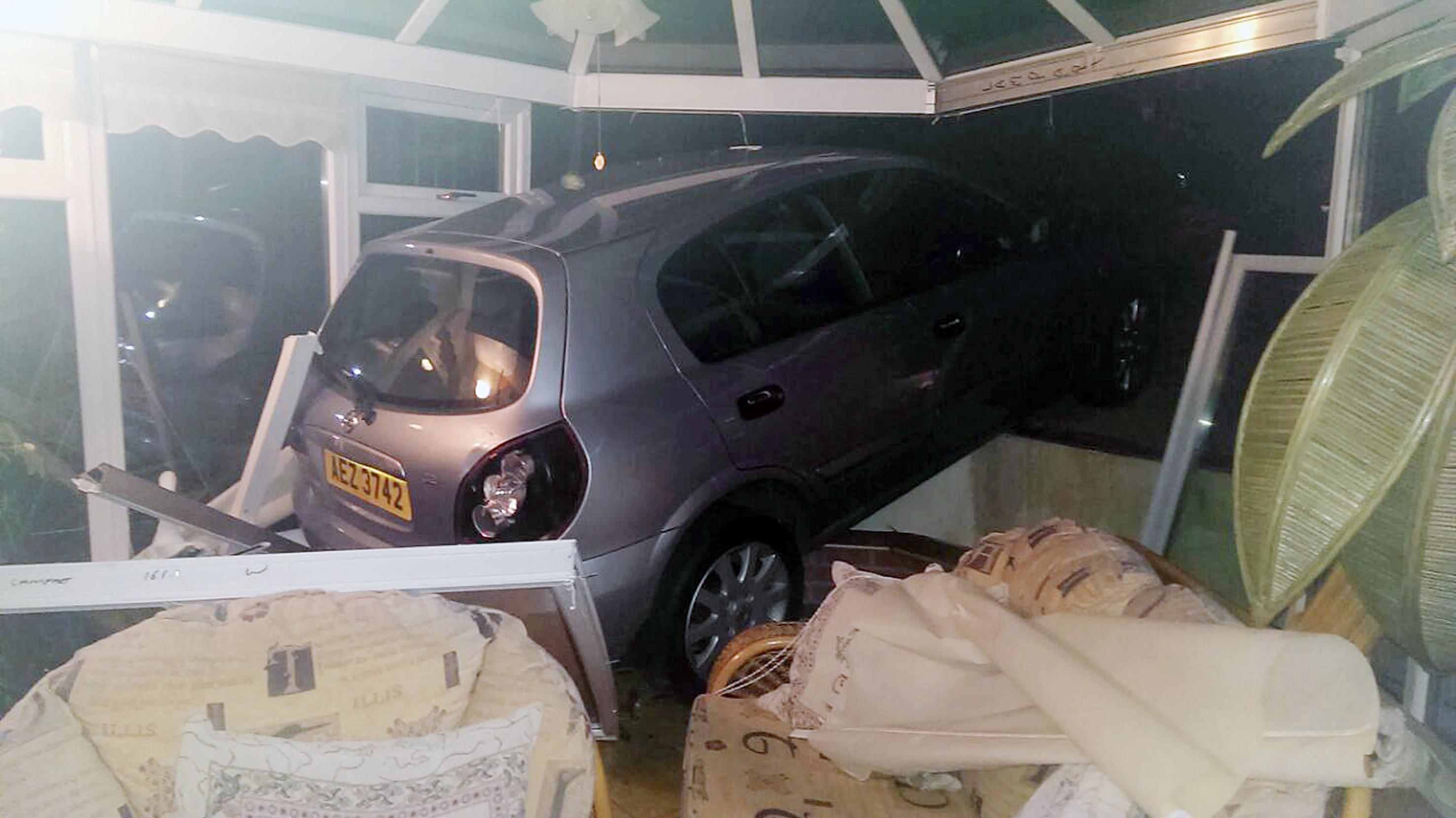 Elderly couple have lucky escape as car crashes into house | ITV News ...