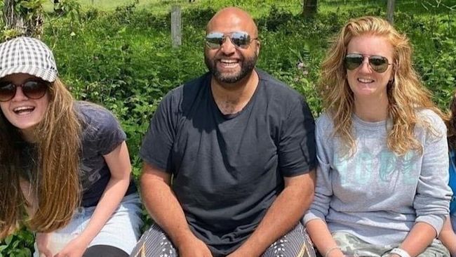 Marcus Alleyne (centre) with his family