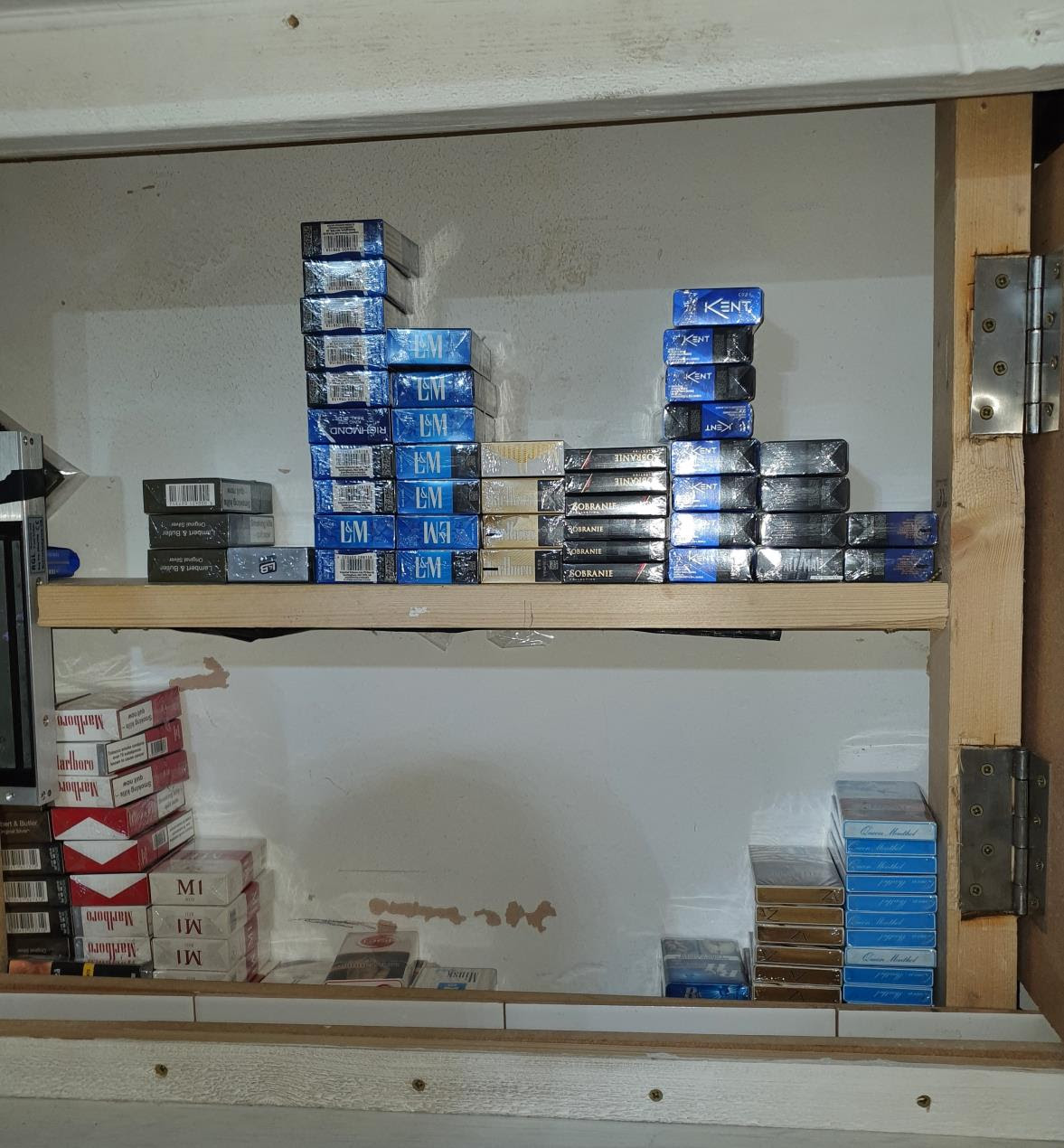 police seized 7 million suspected counterfeit cigarettes in preston raids Fake nicotine products found hidden in secret cupboard during Preston raids