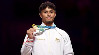 Jake Jarman with one of his gold medals from the Commonwealth Games.