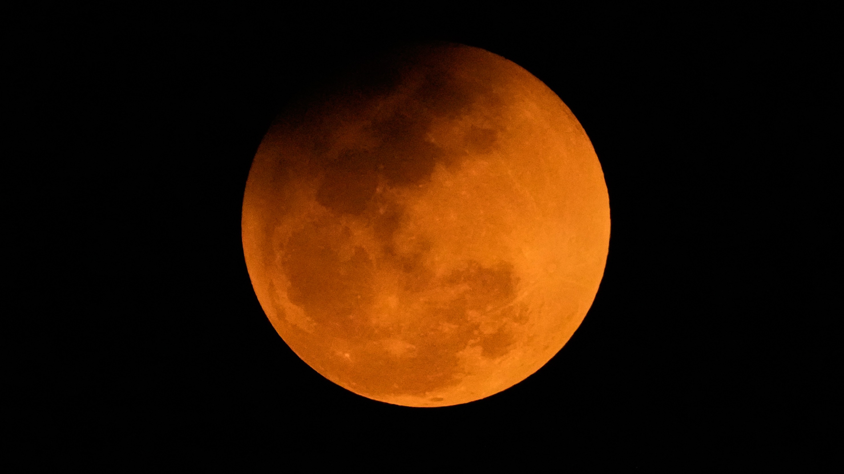 Parts of the world treated to a rare 'blood moon' during total lunar eclipse
