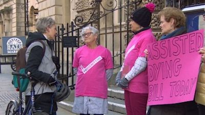 Assited dying campaigner (centre) Pauline Carroll