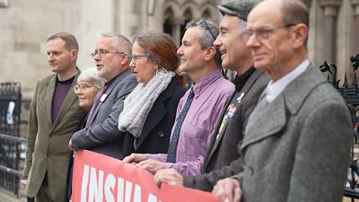 RETRANSMISSION CORRECTION ON SPELLING OF PAUL SHEEKEY TO SHEEKY BEST QUALITY AVAILABLE Screengrab taken from PA Video of Insulate Britain supporters (L to R) Paul Sheeky,Rev Sue Parfitt, Biff Whipster, Ruth Jarman, Steve Pritchard, Steve Gower, Richard Ramsde outside the High Court, central London. Picture date: Tuesday December 14, 2021. Insulate Britain protesters are to face contempt of court proceedings at the High Court in relation to civil injunctions issued to prevent their protest action.

