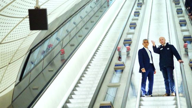 London Mayor Sadiq Khan and TFL Commissioner Andy Byford travel down an escalator during a tour of Bond Street Elizabeth line station in central London, which is due to open on October 24 after several delays. Picture date: Tuesday October 18, 2022.

