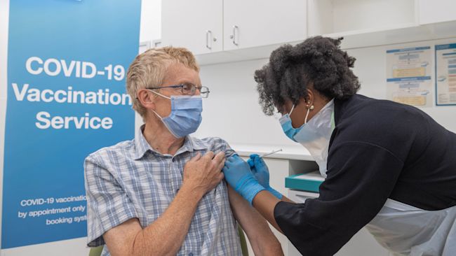 Covid booster booking wales