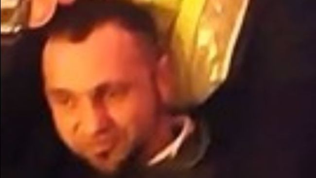 Image released by Avon and Somerset Police after security guard had his front teeth knocked out