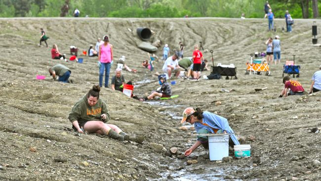 People dig for diamonds at Crater of Diamonds State Park. 