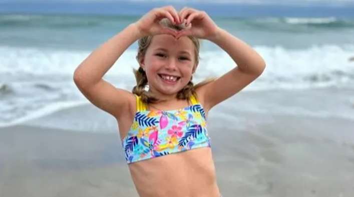 Family pay tribute to 'beautiful' daughter, 7, killed in sand hole collapse