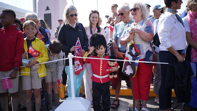 Theo Godfrey, four, dressed as a guard as he waited for King Charles in Bermuda