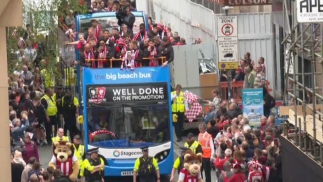 Exeter City celebrated promotion to League One with an open top bus tour
