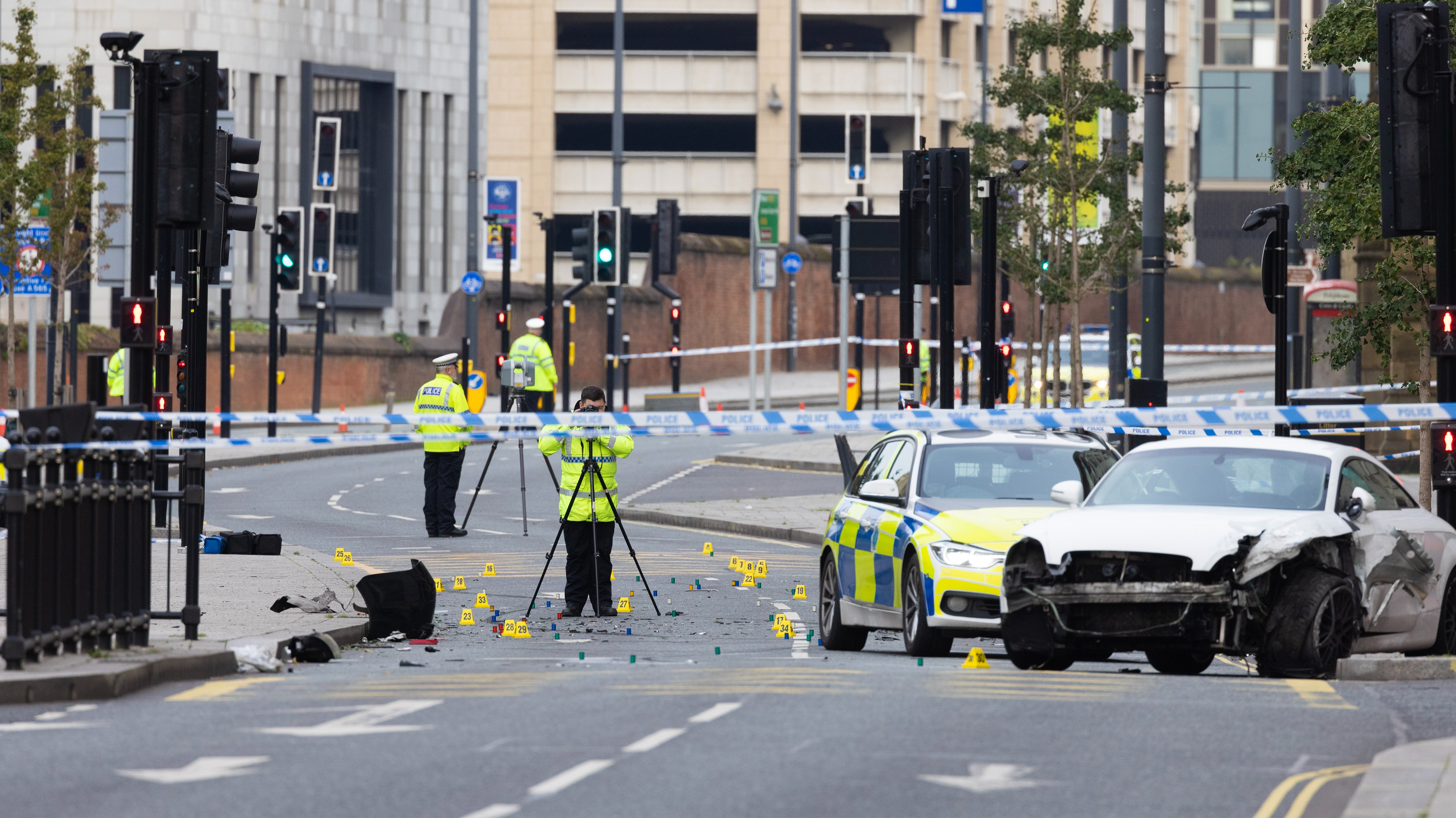 Man in critical condition and three arrested following crash in