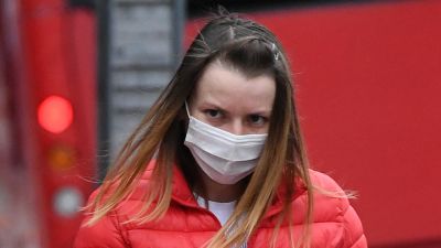 Aurora Iacomi, 31, arrives at Inner London Crown Court for sentencing after she admitted putting cleaning fluid into her supervisor's coffee flask at Fenchurch Street railway station on April 22.