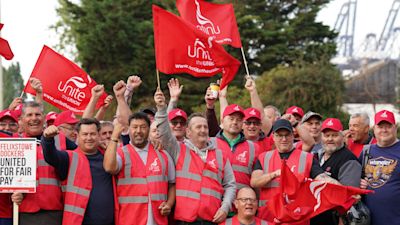 Members of the Unite union man a picket line at one of the entrances to the Port of Felixstowe in Suffolk, Britain's biggest and busiest container port, after backing industrial action by 9-1 in a dispute over pay.
Credit: PA