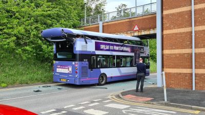 bus roof detached after hitting bridge in Sheffield 