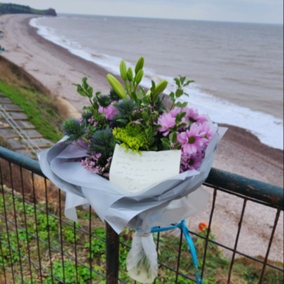 Floral tributes at Budleigh Salterton beach