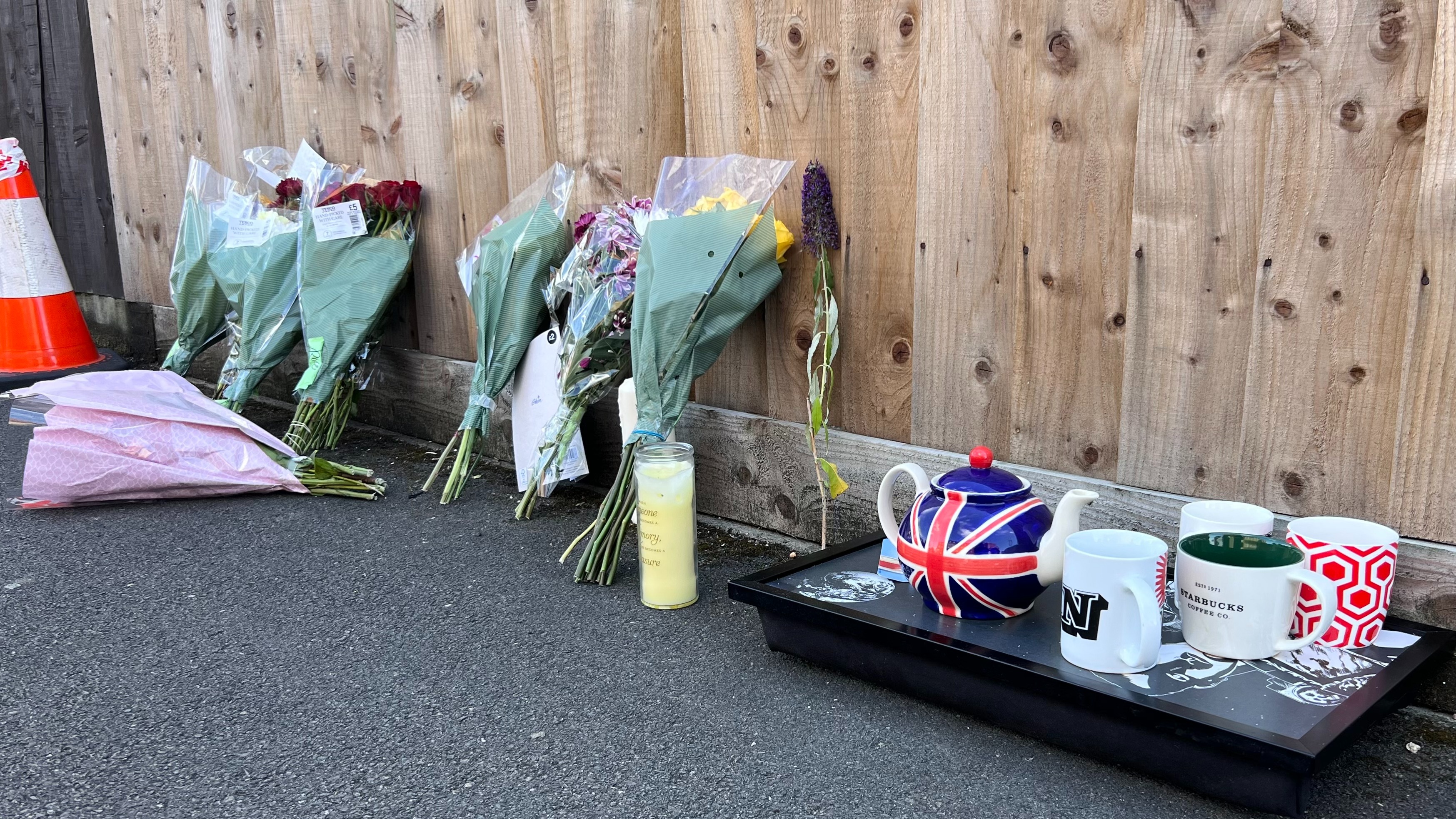 Flowers and cards left in tribute at scene of Bedford street stabbing