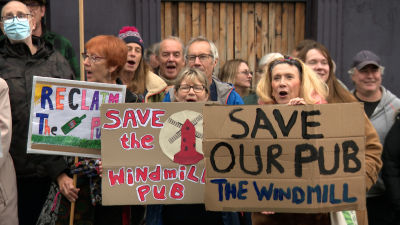 Protesters outside The Windmill pub in Windmill Hill, Bristol