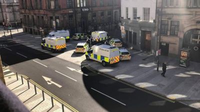 Police converged on a Liverpool city centre apart-hotel