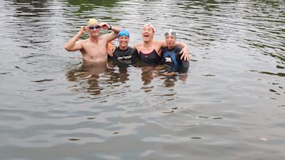 Jacquie Hughes (second right) celebrating her son Tom Dean's second gold