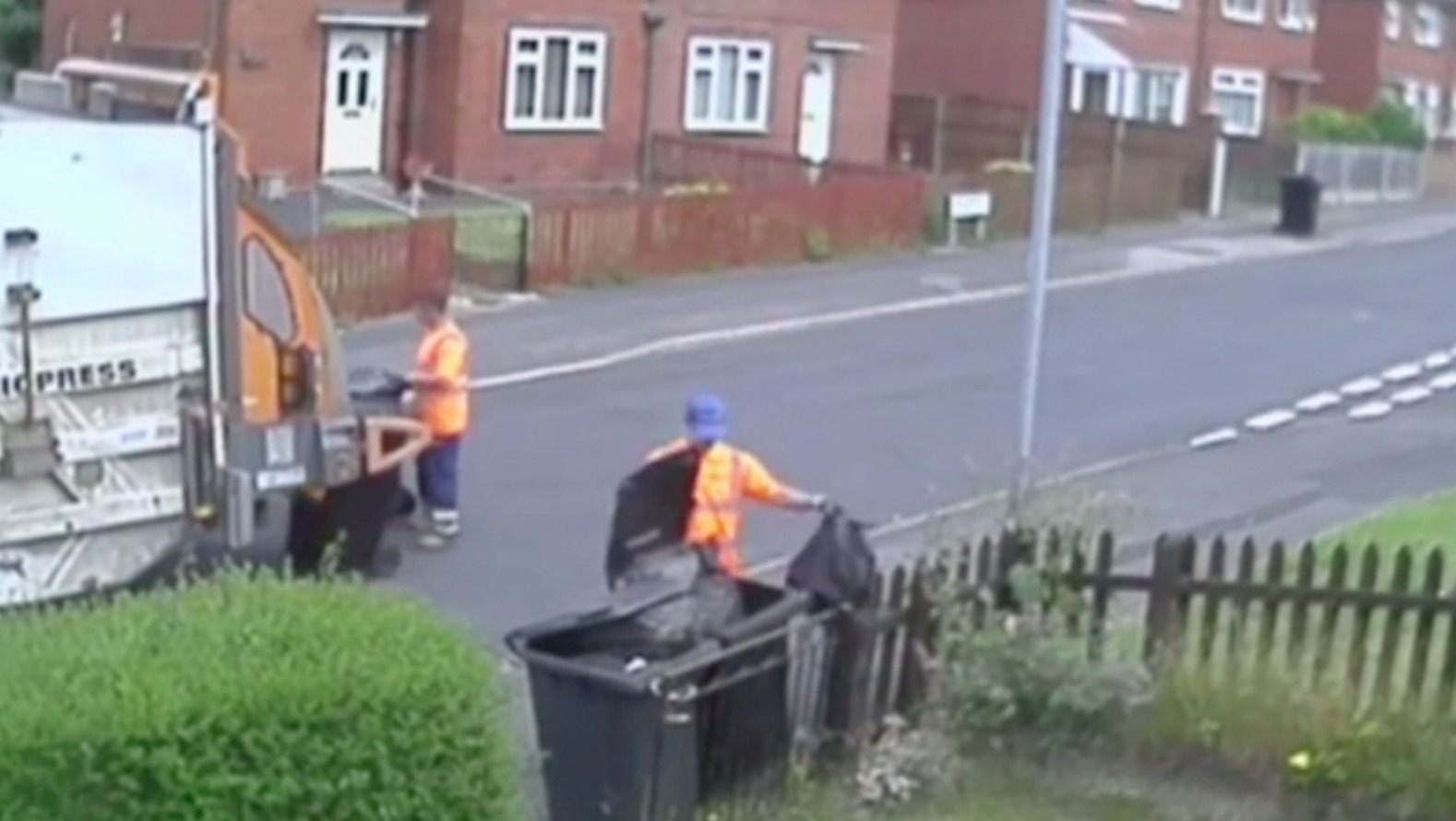 Bin man caught on CCTV throwing rubbish out of bin and onto the street